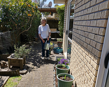 Ann in her sunny Pāpāmoa patch